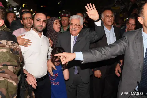 Palestinian President Mahmoud Abbas roams at the streets on the West Bank city of Ramallah on June 20, 2017. Photo by Thaer Ganaim