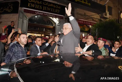 Palestinian President Mahmoud Abbas roams at the streets on the West Bank city of Ramallah on June 20, 2017. Photo by Thaer Ganaim