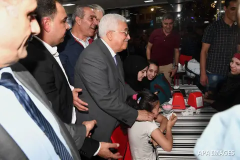 Palestinian President Mahmoud Abbas roams at the streets on the West Bank city of Ramallah on June 20, 2017. Photo by Thaer Ganaim