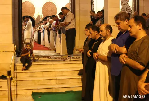 Palestinian Muslim worshippers pray overnight on July 22, 2017 at a Mosque in Gaza city on the occasion of Laylat al-Qadr which falls on the 27th day of the fasting month of Ramadan. Laylat al-Qadr, or Night of Destiny,...