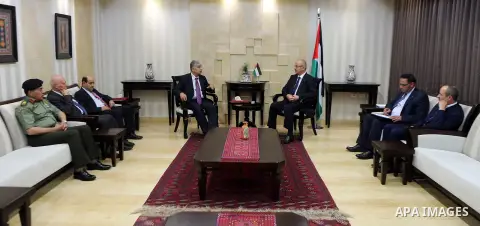 Palestinian Prime Minister Rami Hamdallah receives report of the Palestinian retirement Authority for 2016, at his office in the West Bank city of Ramallah on June 22, 2017. Photo by Prime Minister Office