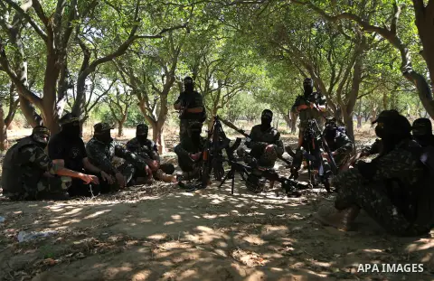Palestinian militants from the Al-Quds Brigades, the armed wing of the Islamic Jihad movement guard the border in the east of Gaza city on the Muslim holy fasting month of Ramadan on June 22, 2017. Ramadan is sacred to M...