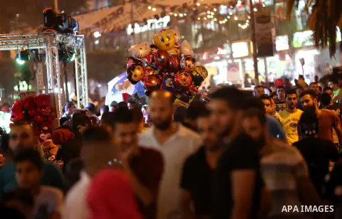 Palestinians shop at a market a few days ahead of Eid al-Fitr holiday, in the West Bank city of Nablus on June 23, 2017. Eid al-Fitr marks the end of Muslim's holy fasting month of Ramadan when faithfuls abstain from eat...