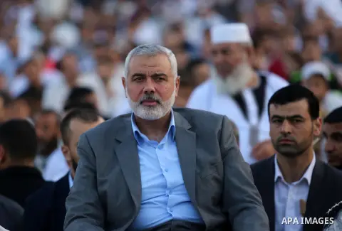 Hamas Chief Ismail Haniyeh attends Eid al-Fitr prayers in Gaza City June 25, 2017. Eid al-Fitr marks the end of Muslim's holy fasting month of Ramadan when faithfuls abstain from eating, drinking, smoking and sexual acti...