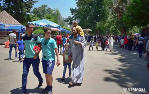 Egyptians enjoy at a zoo on the second day of of Eid al-Fitr holiday which marks the end of the Muslim holy month of Ramadan, in Cairo June 26, 2017. Photo by Amr Sayed