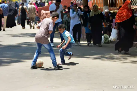 Egyptians enjoy at a zoo on the second day of of Eid al-Fitr holiday which marks the end of the Muslim holy month of Ramadan, in Cairo June 26, 2017. Photo by Amr Sayed