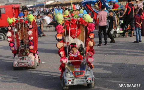 Palestinians celebrate on the second day of Eid al-Fitr holiday which marks the end of the Muslim holy month of Ramadan at the seaport of Gaza city June 26, 2017. Photo by Mohammed Asad