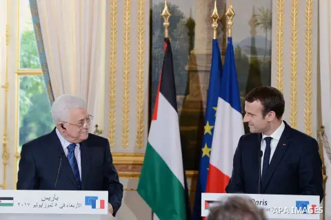 French President Emmanuel Macron and Palestinian President Mahmoud Abbas, hold a joint press conference following their meeting at the Elysee Palace in Paris, on July 5, 2017. Photo by Thaer Ganaim