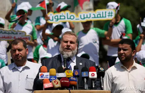 Senior Hamas Leader Osama Al Mazin, speaks during a press conference to announce the start of summer camps organized by the Hamas movement in Gaza city on July 8, 2017. Photo by Ashraf Amra