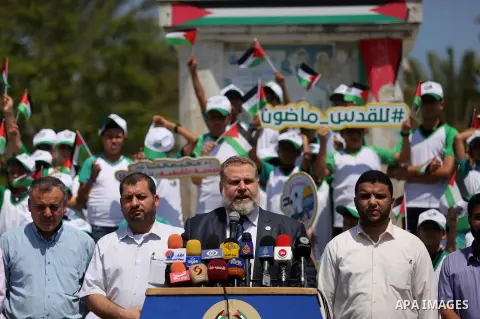 Senior Hamas Leader Osama Al Mazin, speaks during a press conference to announce the start of summer camps organized by the Hamas movement in Gaza city on July 8, 2017. Photo by Ashraf Amra