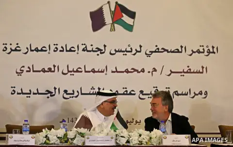 Qatar's Ambassador to the Palestinian Authority Mohammed Al Emadi talks with Director of UNRWA operations in Gaza Bo Shack during a press confrence in Gaza City, on July 11, 2017. The Gaza Strip may already be "unlivable...