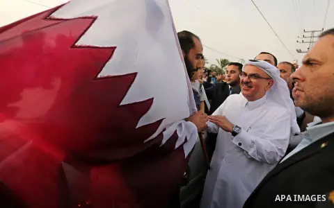 Qatar's Ambassador to the Palestinian Authority, Mohammed Al Emadi attends the opening ceremony of rebuild Salah Al-Deen street project -Phase IV- funded by Qatar in al-Nusairat in the center of Gaza strip, on July 11, 2...