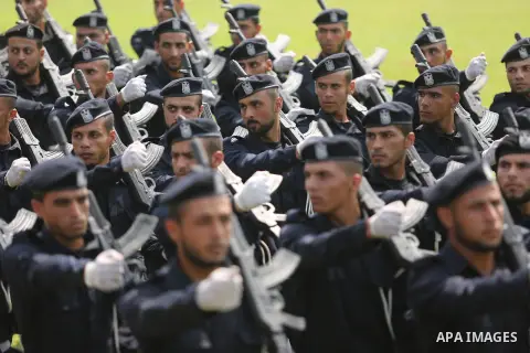 Palestinian policemen take part in a graduation ceremony, in Gaza City on July 17, 2017. Photo by Ashraf Amra