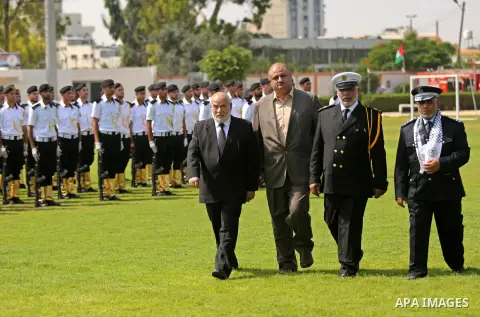 Palestinian policemen take part in a graduation ceremony, in Gaza City on July 17, 2017. Photo by Ashraf Amra