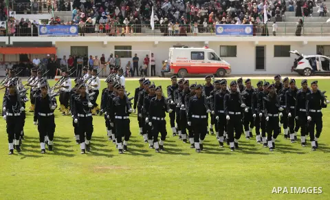 Palestinian policemen take part in a graduation ceremony, in Gaza City on July 17, 2017. Photo by Ashraf Amra