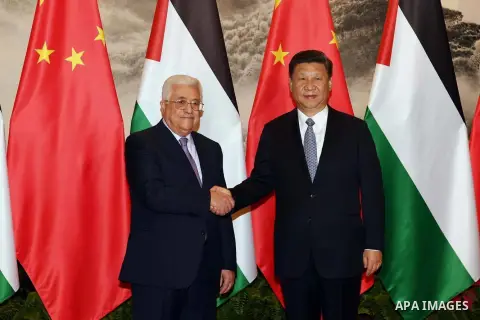 Palestinian President Mahmoud Abbas, shakes hands Chinese President Xi Jinping, during a signing ceremony at the Great Hall of the People in Beijing, China, on July 18, 2017. Abbas is on an official visit to China from J...