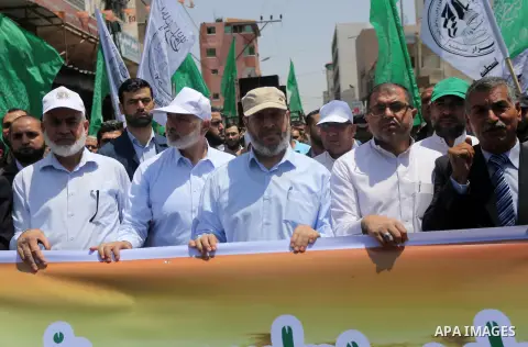 Hamas Chief Ismail Haniyeh takes part during a protest against Israel's newly-installed security measures at the entrance to the al-Aqsa mosque compound in Gaza city on July 21, 2017. Photo by Mohammed Asad
