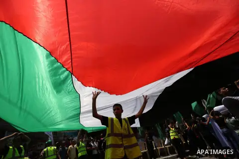 Palestinian demonstrators take part in a protest against Israel's new security measures at the entrance to the al-Aqsa mosque compound, which include metal detectors and cameras, in Khan Younis in the the southern Gaza s...