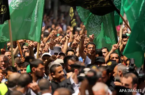 Palestinian demonstrators take part in a protest against Israel's new security measures at the entrance to the al-Aqsa mosque compound, which include metal detectors and cameras, in Khan Younis in the the southern Gaza s...