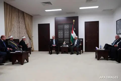 Palestinian president Mahmoud Abbas meets with Mufti of Jerusalem and Palestine, Sheikh Mohammed Hussein and Governor of Jerusalem at his office, in the West Bank city of Ramallah, on July 21, 2017. Photo by Thaer Ganaim