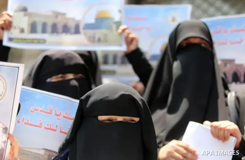 Palestinian supporters of Islamic Jihad take part in a protest against Israel's new security measures at the entrance to the al-Aqsa mosque compound, which include metal detectors and cameras, in Gaza City on July 23, 20...