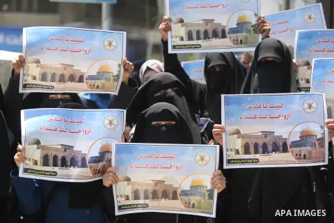 Palestinian supporters of Islamic Jihad take part in a protest against Israel's new security measures at the entrance to the al-Aqsa mosque compound, which include metal detectors and cameras, in Gaza City on July 23, 20...