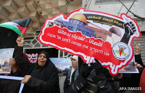 Palestinian supporters of Islamic Jihad take part in a protest against Israel's new security measures at the entrance to the al-Aqsa mosque compound, which include metal detectors and cameras, in Gaza City on July 23, 20...