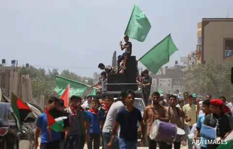 Palestinian supporters of Hamas movement and Islamic Jihad take part in a protest against the recent closure of the Al-Aqsa Mosque compound by Israel, in Jabalia refugee camp in the northern Gaza strip, on July 23, 2017....