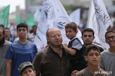 Palestinian supporters of Hamas movement and Islamic Jihad take part in a protest against the recent closure of the Al-Aqsa Mosque compound by Israel, in Jabalia refugee camp in the northern Gaza strip, on July 23, 2017....