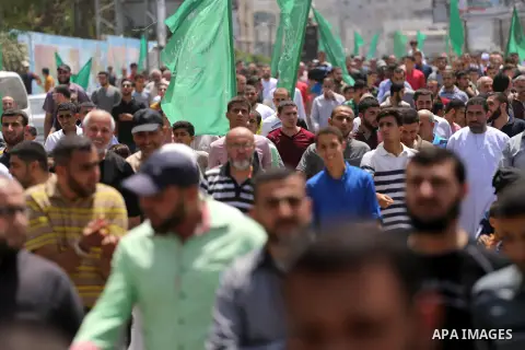 Palestinian supporters of Hamas movement and Islamic Jihad take part in a protest against the recent closure of the Al-Aqsa Mosque compound by Israel, in Jabalia refugee camp in the northern Gaza strip, on July 23, 2017....