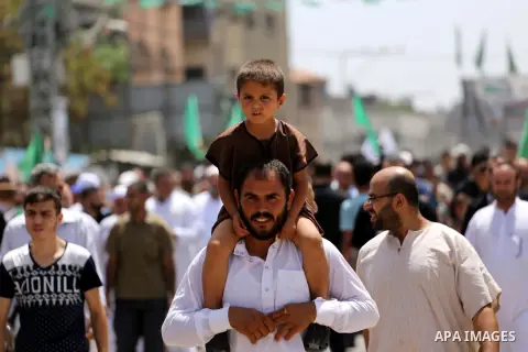 Palestinian supporters of Hamas movement and Islamic Jihad take part in a protest against the recent closure of the Al-Aqsa Mosque compound by Israel, in Jabalia refugee camp in the northern Gaza strip, on July 23, 2017....
