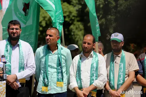 Palestinian supporters of Hamas movement take part during a rally to celebrate marking Israel's removal of all security measures it had installed that were implemented at the Al-Aqsa mosque compound in Jerusalem, in Gaza...