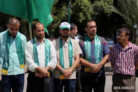 Palestinian supporters of Hamas movement take part during a rally to celebrate marking Israel's removal of all security measures it had installed that were implemented at the Al-Aqsa mosque compound in Jerusalem, in Gaza...