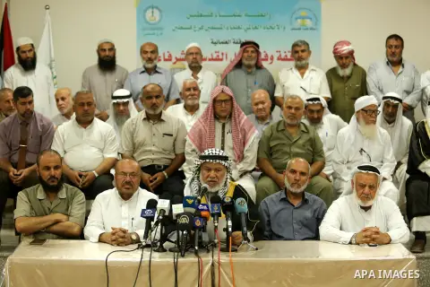 Marwan Abu Ras, a head of the Palestine Scholars Association, speaks during a press conference to show solidarity with Palestinians in Jerusalem, in Gaza city on July 30, 2017. Photo by Ashraf Amra