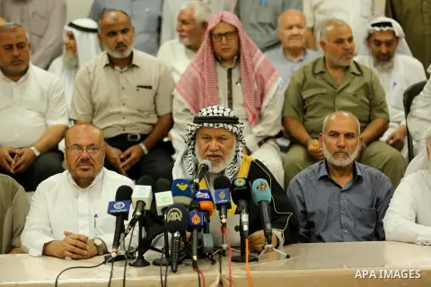 Marwan Abu Ras, a head of the Palestine Scholars Association, speaks during a press conference to show solidarity with Palestinians in Jerusalem, in Gaza city on July 30, 2017. Photo by Ashraf Amra