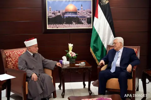 Palestinian President Mahmoud Abbas meets with Mufti of Jerusalem and Palestine, Sheikh Mohammed Hussein, at his headquarter in the West Bank city of Ramallah, on August 2, 2017. Photo by Thaer Ganaim
