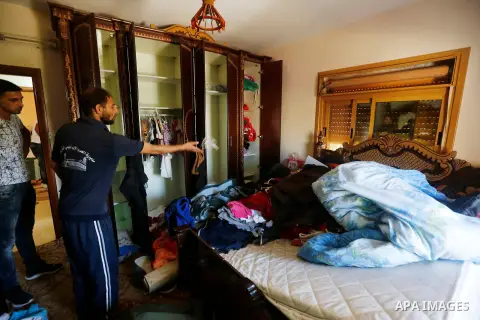 Palestinians check a damage after the Israeli army stormed the house and arrested two people, in the West Bank city of Hebron, on August 8, 2017. Israeli army stormed two house in the last night in hebron search for weap...