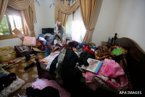 Palestinians check a damage after the Israeli army stormed the house and arrested two people, in the West Bank city of Hebron, on August 8, 2017. Israeli army stormed two house in the last night in hebron search for weap...