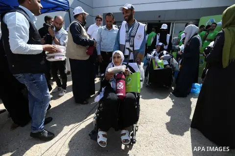 Palestinian Muslim pilgrims arrive at the Rafah border crossing between Egypt and the southern Gaza Strip, on August 14, 2017, ahead of their departure to the annual Hajj pilgrimage in Saudi Arabia's holy city of Mecca....
