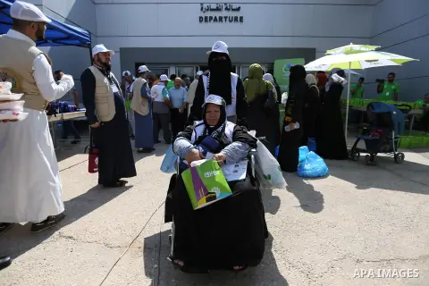 Palestinian Muslim pilgrims arrive at the Rafah border crossing between Egypt and the southern Gaza Strip, on August 14, 2017, ahead of their departure to the annual Hajj pilgrimage in Saudi Arabia's holy city of Mecca....