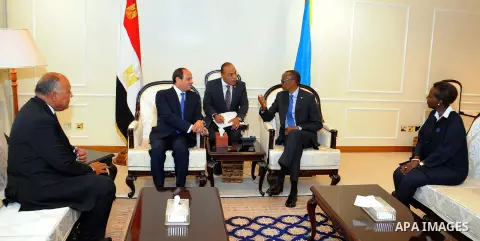 Egyptian President Abdel Fattah al-Sisi meets with Rwandan President Paul Kagame after al-Sisi's arrival at Kigali International Airport on August 15, 2017. The Egyptian President is paying a two day visit to Rwanda. Pho...