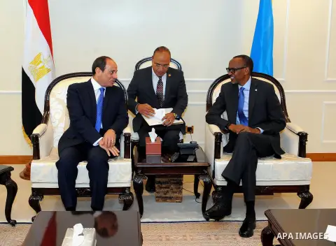 Egyptian President Abdel Fattah al-Sisi meets with Rwandan President Paul Kagame after al-Sisi's arrival at Kigali International Airport on August 15, 2017. The Egyptian President is paying a two day visit to Rwanda. Pho...
