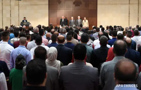Palestinian President Mahmoud Abbas meets with members of the territories of the Fatah movement, in the West Bank city of Ramallah, on August 15, 2017. Photo by Thaer Ganaim