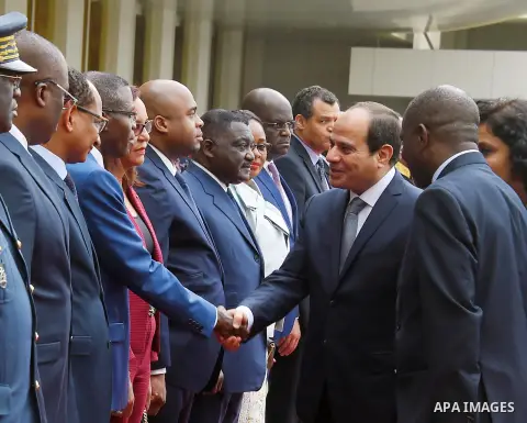 Egyptian President Abdel Fattah al-Sisi shakes hands with Gabon's officials upon his arrive to Libreville the capital of Gabon, on August 16, 2017. Photo by Egyptian President Office