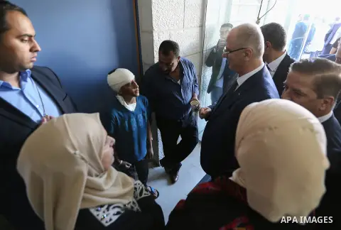 Palestinian Prime Minister, Rami Hamdallah, opens the new branch of Khadouri University, in the West Bank city of Ramallah, on August 23, 2017. Photo by Prime Minister Office