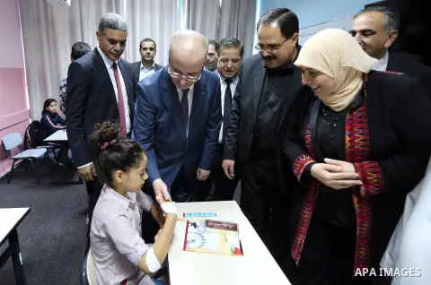 Palestinian Prime Minister, Rami Hamdallah, opens the new branch of Khadouri University, in the West Bank city of Ramallah, on August 23, 2017. Photo by Prime Minister Office