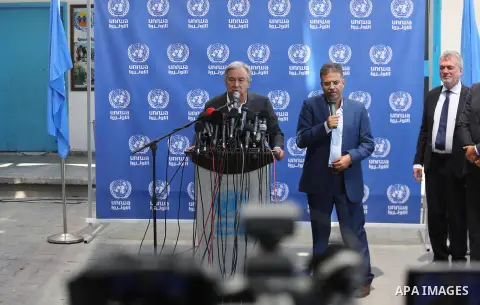 United Nations Secretary General Antonio Guterres delivers a statement to the media, during a visit to a UN School in Beit Lahia in the northern Gaza Strip on August 30, 2017. Photo by Mohammed Asad