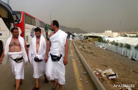 Muslim pilgrims walk near Mount Arafat, also known as Jabal al-Rahma (Mount of Mercy), southeast of the Saudi holy city of Mecca, on Arafat Day which is the climax of the Hajj pilgrimage early on August 31, 2017. Arafat...