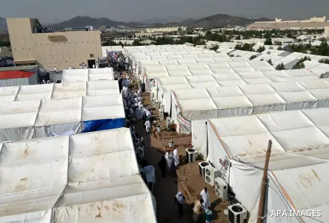 Muslim pilgrims rest near Mount Arafat, also known as Jabal al-Rahma (Mount of Mercy), southeast of the Saudi holy city of Mecca, on Arafat Day which is the climax of the Hajj pilgrimage early on August 31, 2017. Arafat...