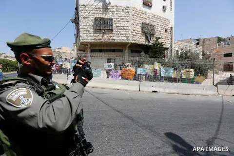 An Israeli border policeman stand guard during a demonstration organised by young Palestinians in Hebron on September 3, 2017, against a recent decision by Israel to boost the powers of the settlers in the occupied West...